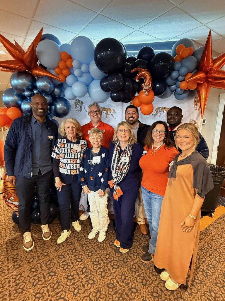 Greater Birmingham Auburn Club board members and volunteers at an Auburn event