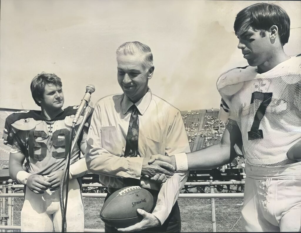 Jimmy Brown presenting an award